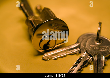 Yale type lock and three keys on a key ring, sterling cylinder lock, Cylinder keys and lock, lock and key, lock and keys, Yale keys and lock, Stock Photo