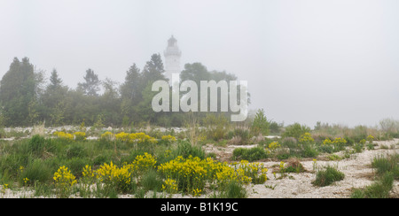 Panorama of Cana Island Lighthouse on Lake Michigan Shrouded in Fog Door County Wisconsin Stock Photo