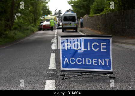 police accident temporary sign in the middle of the road at the scene of a road traffic accident county down northern ireland Stock Photo