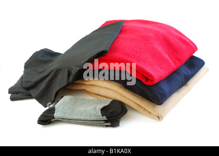 Several items of new clothes isolated on white background Stock Photo