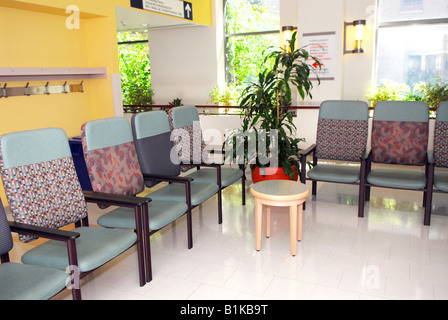 Hospital or clinic waiting room with empty chairs Stock Photo