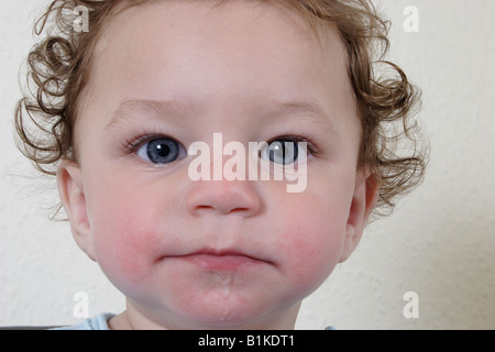 portrait little baby with curly hair Stock Photo