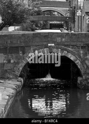 Castlefield in Manchester with canal and lock and Beetham Tower ...