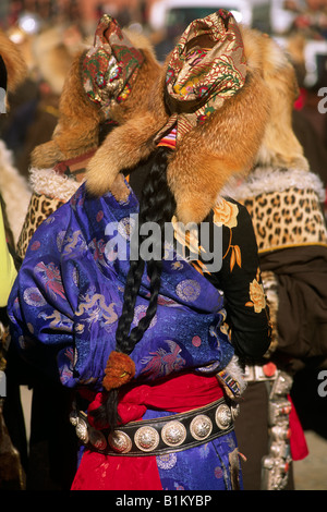 China, Tibet, Gansu province, Xiahé, Labrang monastery, Tibetan New Year's Day, Tibetan woman wearing the traditional Amdo dress Stock Photo