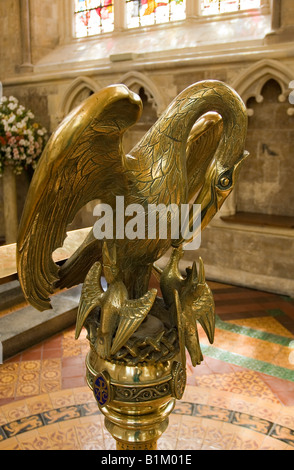 Brass lectern depicting a Pelican in her Piety at Chichester Cathedral, West Sussex, England, UK Stock Photo