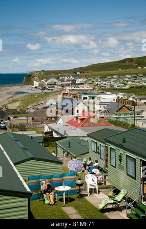 People on summer holiday in static caravans at Clarach Bay holiday camp caravan site Ceredigion Wales UK Stock Photo