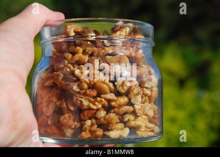 nuts in a clear mason jar Stock Photo