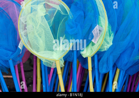 Colorful kids fishing nets. Stock Photo