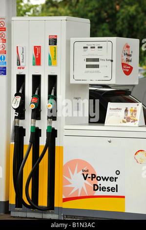 Unleaded petrol and diesel fuel pumps at a Shell filling station Stock Photo
