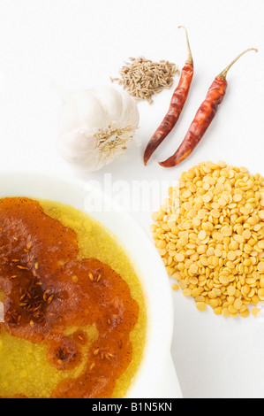 Close-up of lentil soup served in a bowl with its ingredients Stock Photo