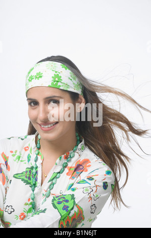 Portrait of a young woman smiling Stock Photo