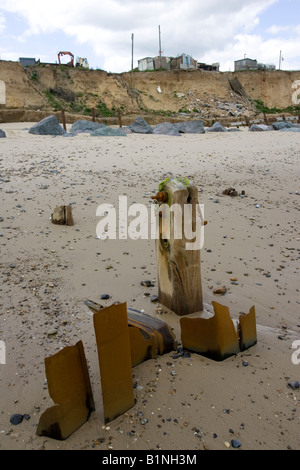 Old and new sea defences to reduce severe coastal erosion Happisburgh North Norfolk Coast UK Stock Photo