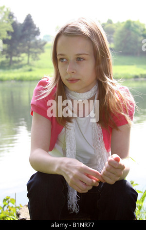 A portrait of a thirteen year old girl in rural England. Stock Photo