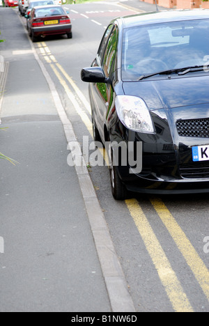 Car Parked on Double Yellow Lines. Stock Photo