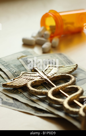 Expensive medicine concept caduceus on US dollar bills Stock Photo