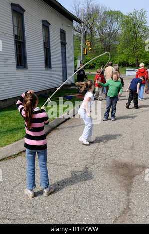 Children playing jump rope Stock Photo - Alamy