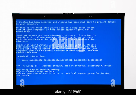 A computer monitor showing the 'Blue Screen of Death' stop error Stock Photo