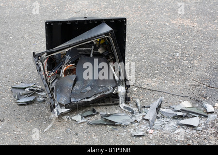 broken tv set on ground Stock Photo