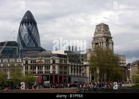 Modern Swiss Re Building and the Tower of London, the historic medieval fortress and palace, London England Stock Photo