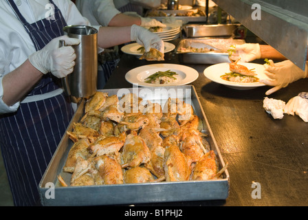 Outside catering chefs and kitchen staff work in marquee for large private function Hampshire UK 2008 2000s HOMER SYKES Stock Photo