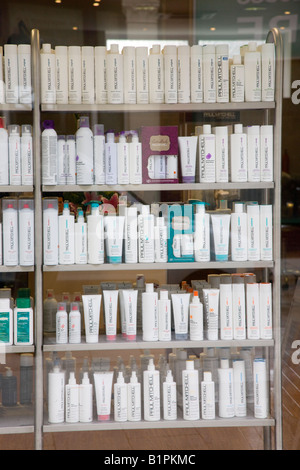 Hair care products in a hair salon shop window Stock Photo
