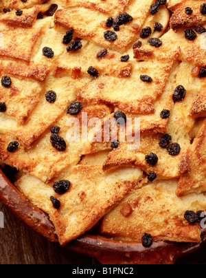 bread and butter pudding terracotta dish Stock Photo