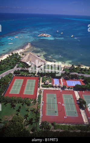 The tennis courts at the Club Med in Cancun Mexico sits empty on a very hot day Stock Photo