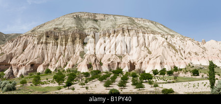 Orchards and rock formations in the Zelve region of Cappadocia, Central Anatolia Turkey Stock Photo