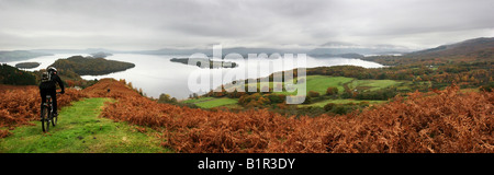 Mountain bikers descending Conic hill on The West Highland Way Stock Photo