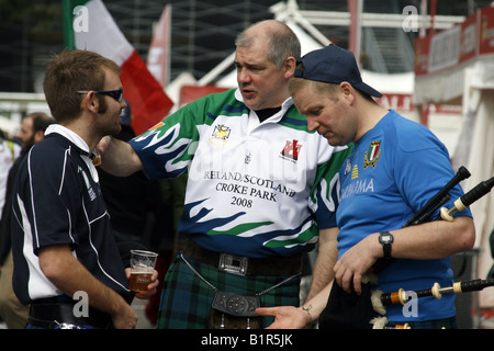 scottish rugby fans wearing tartan kilts Stock Photo - Alamy