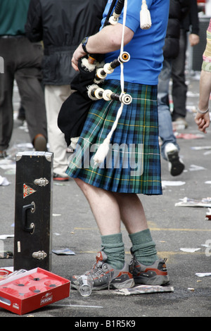 scottish rugby fans wearing tartan kilts Stock Photo - Alamy