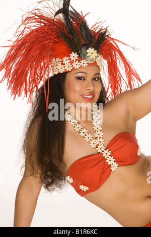 Islander young woman in Tahitian dancing feather headdress Stock Photo