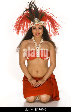 Islander young woman in Tahitian dancing feather headdress Stock Photo