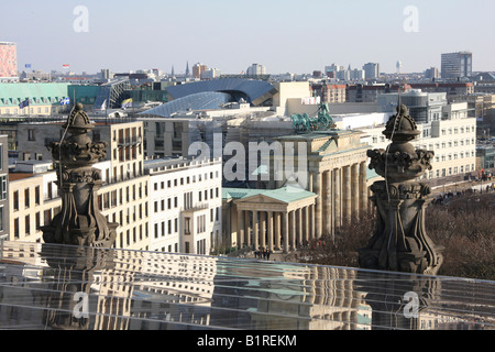 Brandenburg Gate and the roof of the DZ Bank viewed from the roof of the Reichstag or German Parliament Building in Berlin, Ger Stock Photo