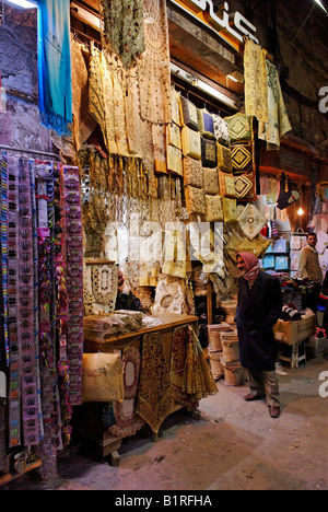 Material and clothing in the souk, Aleppo Bazaar, UNESCO world heritage site, Syria, Arabia, Middle East Stock Photo
