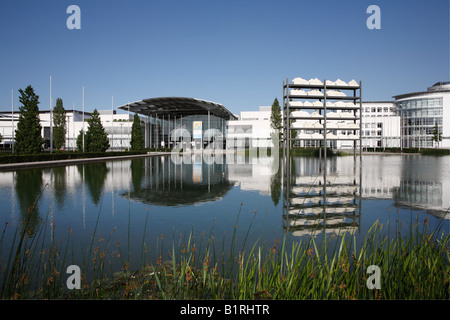 New Munich Trade Fair Centre lake and main entrance, Riem, Munich, Bavaria, Germany, Europe Stock Photo