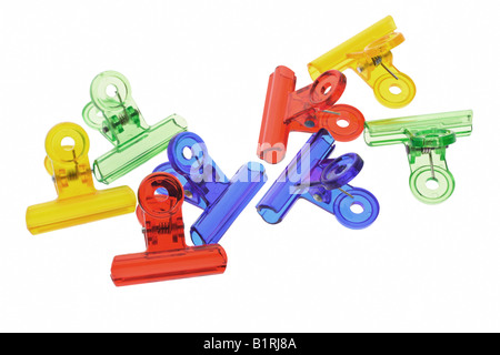 Colored plastic paper clips arranged on white background Stock Photo