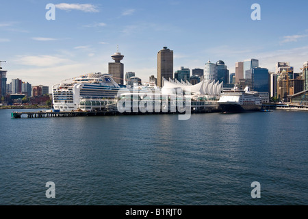 The passenger cruise liner 'Diamond Princess' docked in front of the Pan Pacific Hotel in Vancouver, British Columbia, Canada,  Stock Photo