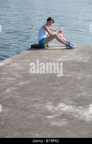 red-haired woman athlete, thirty-six years old, in sports leggings