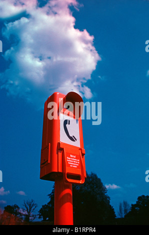 emergency orange phone on motorway in Germany near Ochtrop Stock Photo
