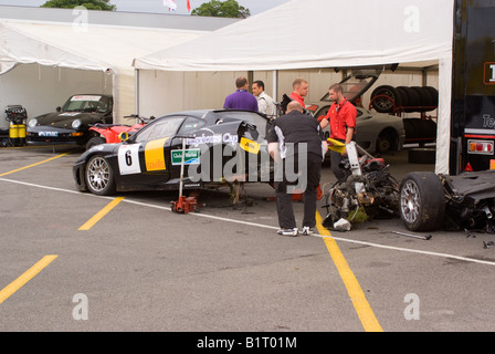 Black Ferrari 360 GT in the Paddock with Written Off Rear End at Oulton Park Motor Racing Circuit Cheshire England UK Stock Photo