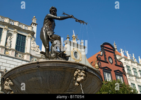 Neptune Fountain in front of townhouses, Gdansk, Poland, Europe Stock Photo