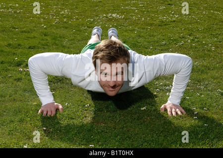 33-year-old man doing push-ups Stock Photo