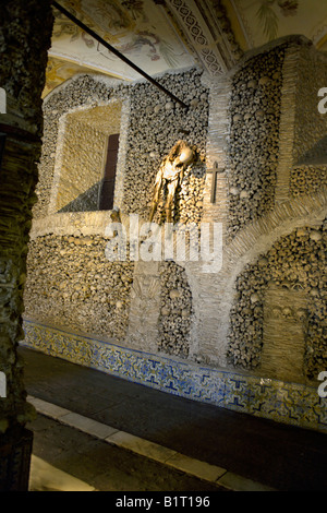 Wall decorated with the mummified bodies of two human beings believed to be father and son, Evora, Alentejo, Portugal, Europe Stock Photo