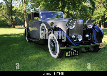 A 1934 Rolls-Royce 20/25 Sports Salon automobile shot in a park like setting. A stunning classic shot. Stock Photo