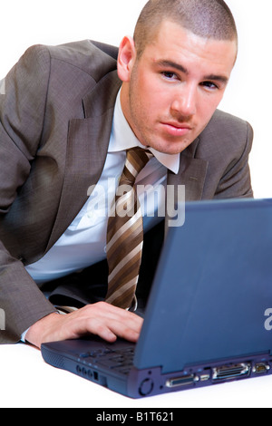 Young businessman using a laptop. Stock Photo