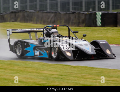 A V de V Juno SSE Sports Racing Car Exits Old Hall Corner at Oulton Park Motor Racing Circuit Cheshire England UK Stock Photo