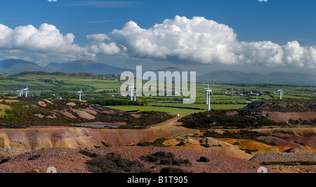 View of wind turbines and mountains of Snowdonia from Parys Mountain Anglesey Wales UK Stock Photo