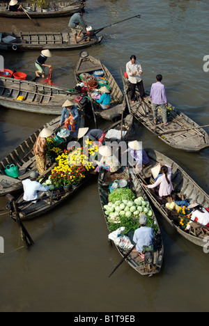 Flower and vegetable sellers Cai Rang Floating Market Mekong Delta Vietnam Stock Photo