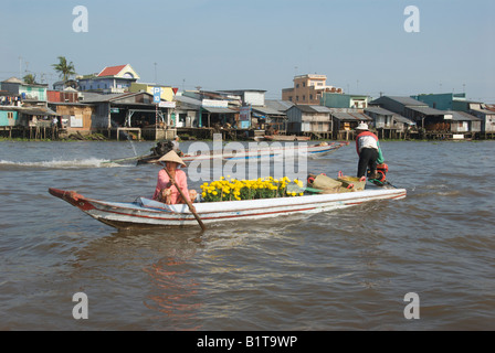 Flower sellers Cai Rang Floating Market Mekong Delta Vietnam Stock Photo